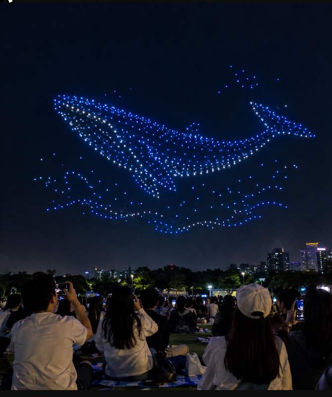 900 drones forming patterns above Olympic Park 88 Lawn during the Hanseong Baekje Cultural Festival drone light show at night